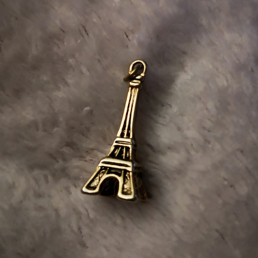Gold tone effiel tower pendant